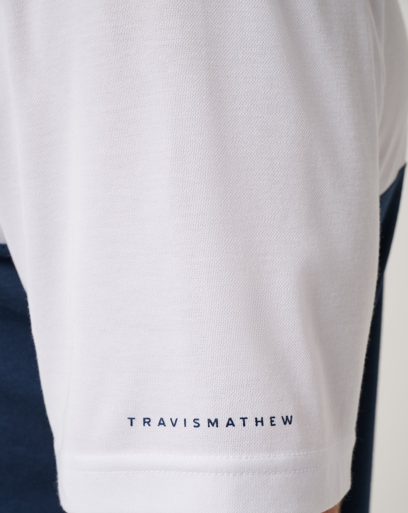 White/Navy Travis Mathew
